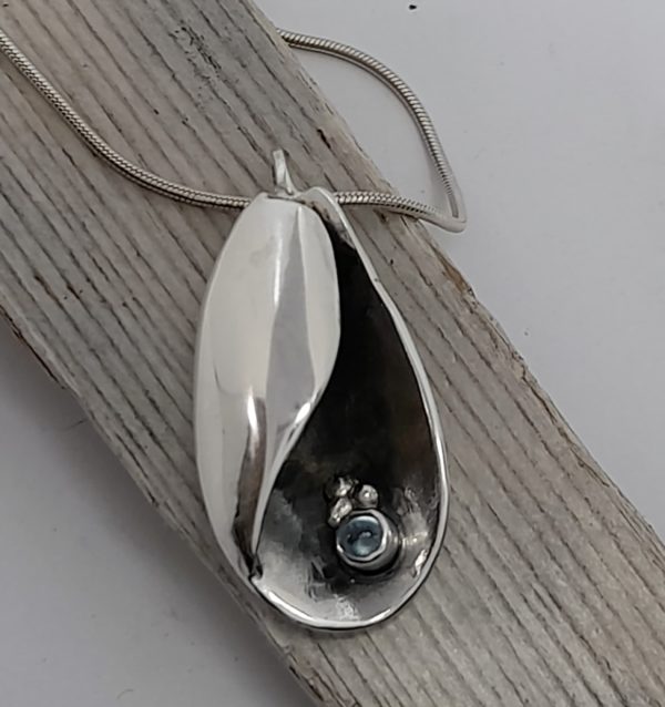 Silver Canoe Shell Pendant with Blue Topaz