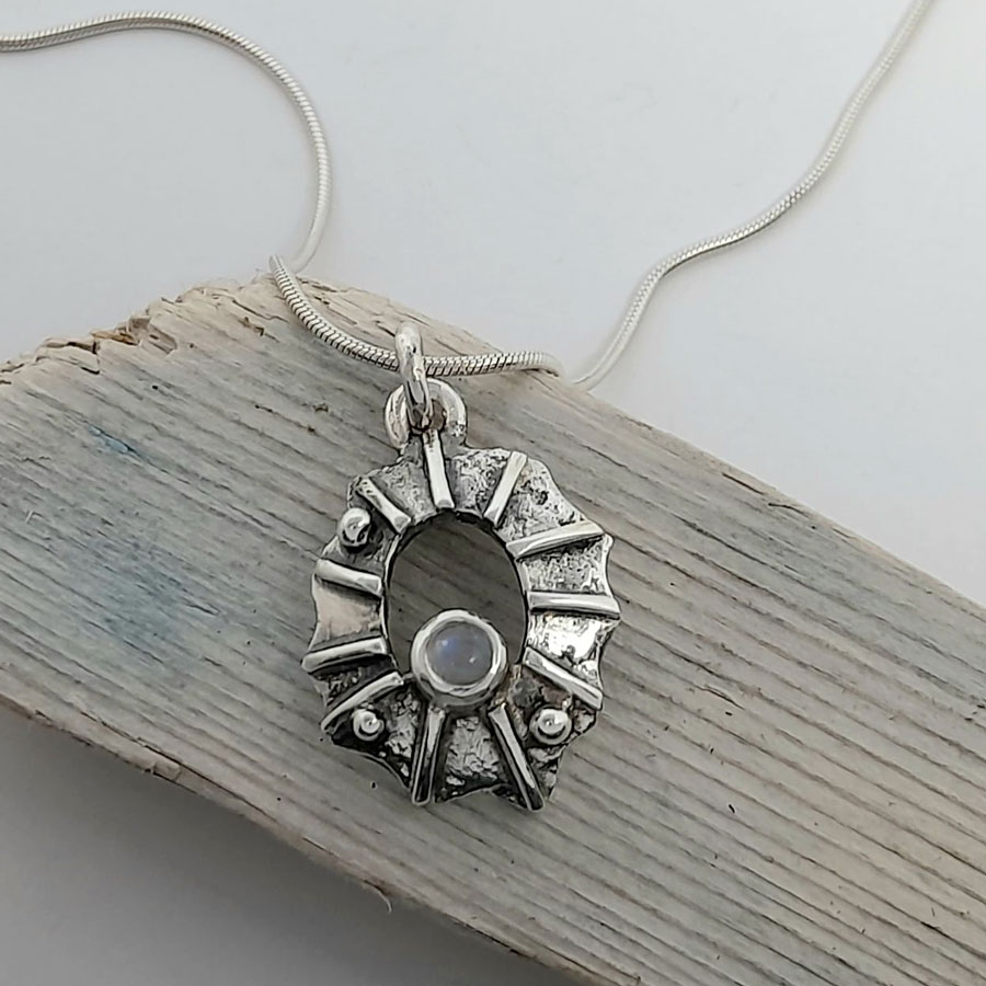 limpet shell pendant with moonstone