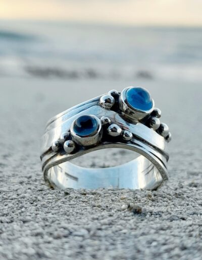 wave ring with topaz